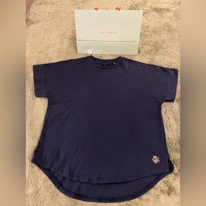 TED BAKER  Deep Blue Tee w/ Curved Hemline & Embroidered Flower Accent - Size 4